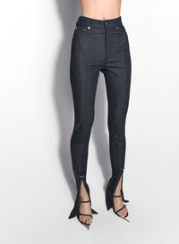 PIERCED RAW DENIM SKINNY JEANS