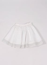 Short skirt with eyelets - White