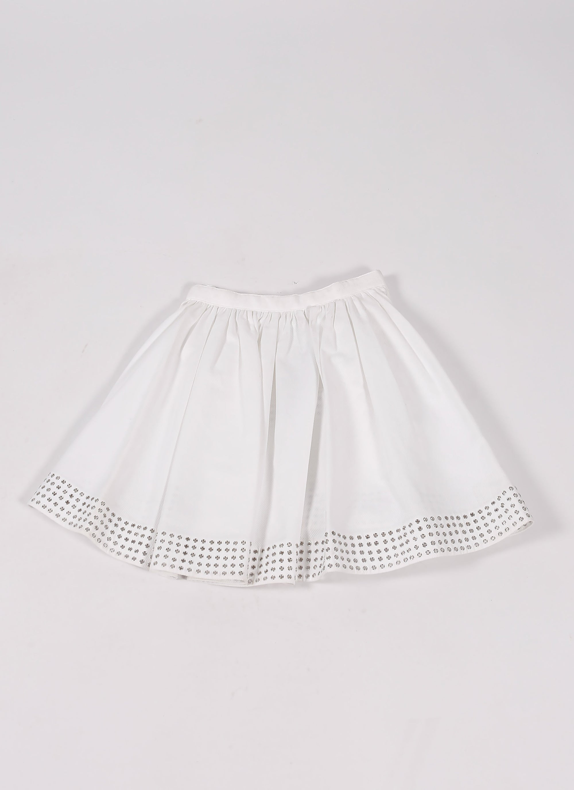 Short skirt with eyelets - White