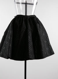 Mini-jupe avec détails géométriques contrastés - Noir