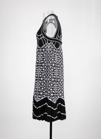 Robe moulante à basque avec finitions ondulées - Noir & Blanc