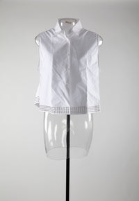 Straight sleeveless shirt with eyelets - White