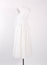 Embroidered dress with crossed back straps - White