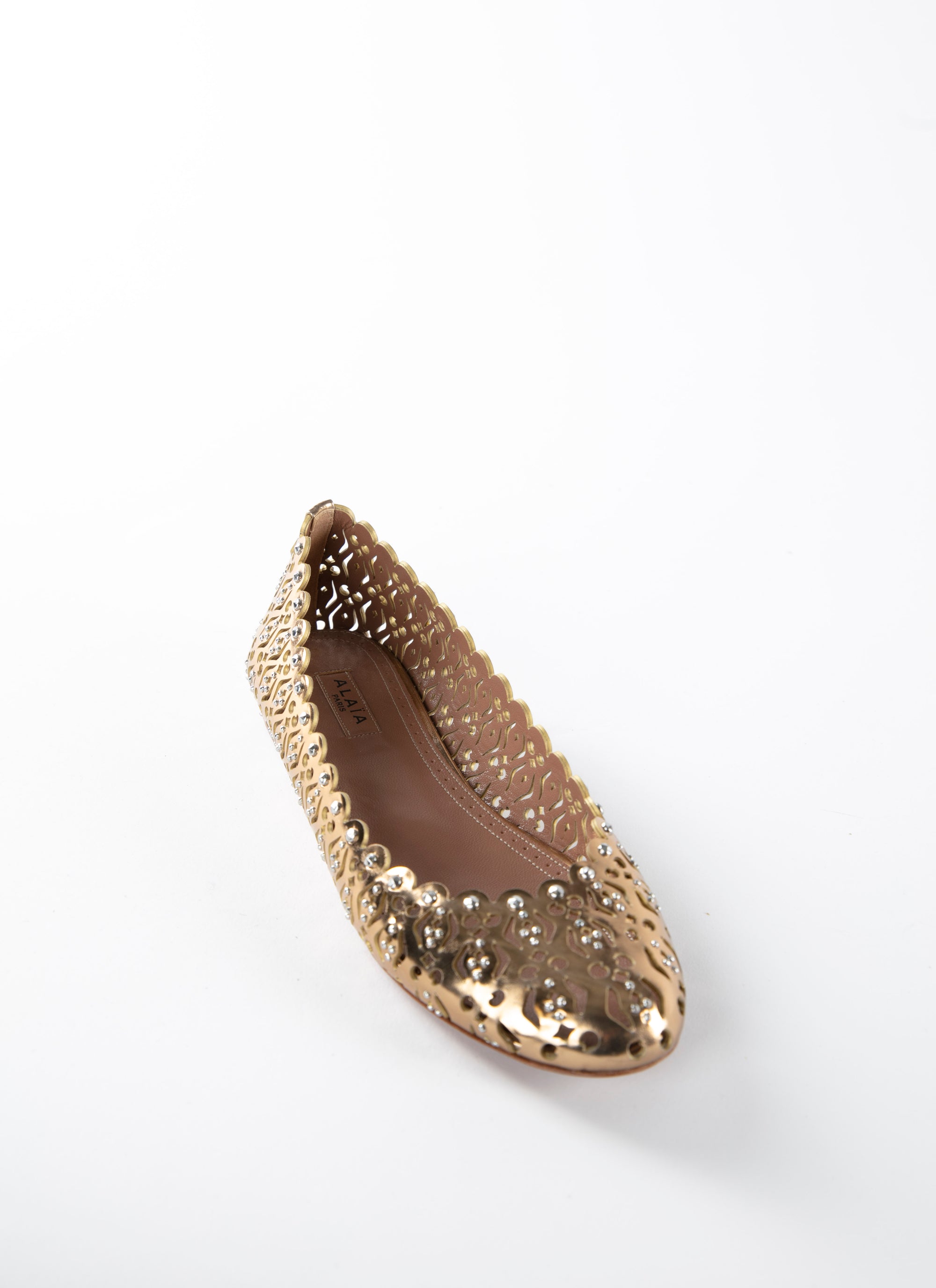Perforated and studded round-toe ballerina flats in leather - Gold