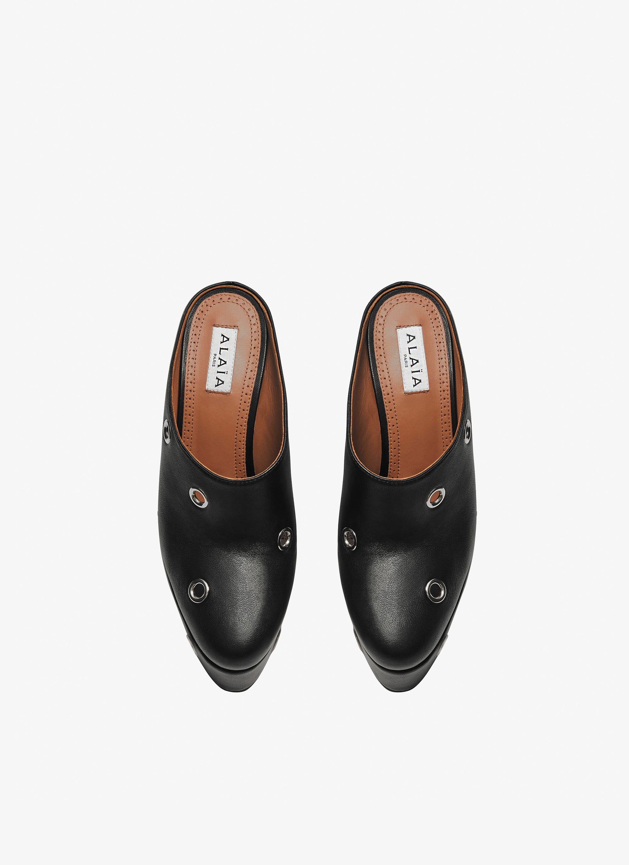 Square-heeled mules with maxi eyelets in leather - Black