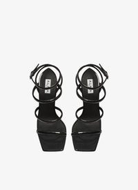 Sandales à talons perforées en cuir verni - Noir