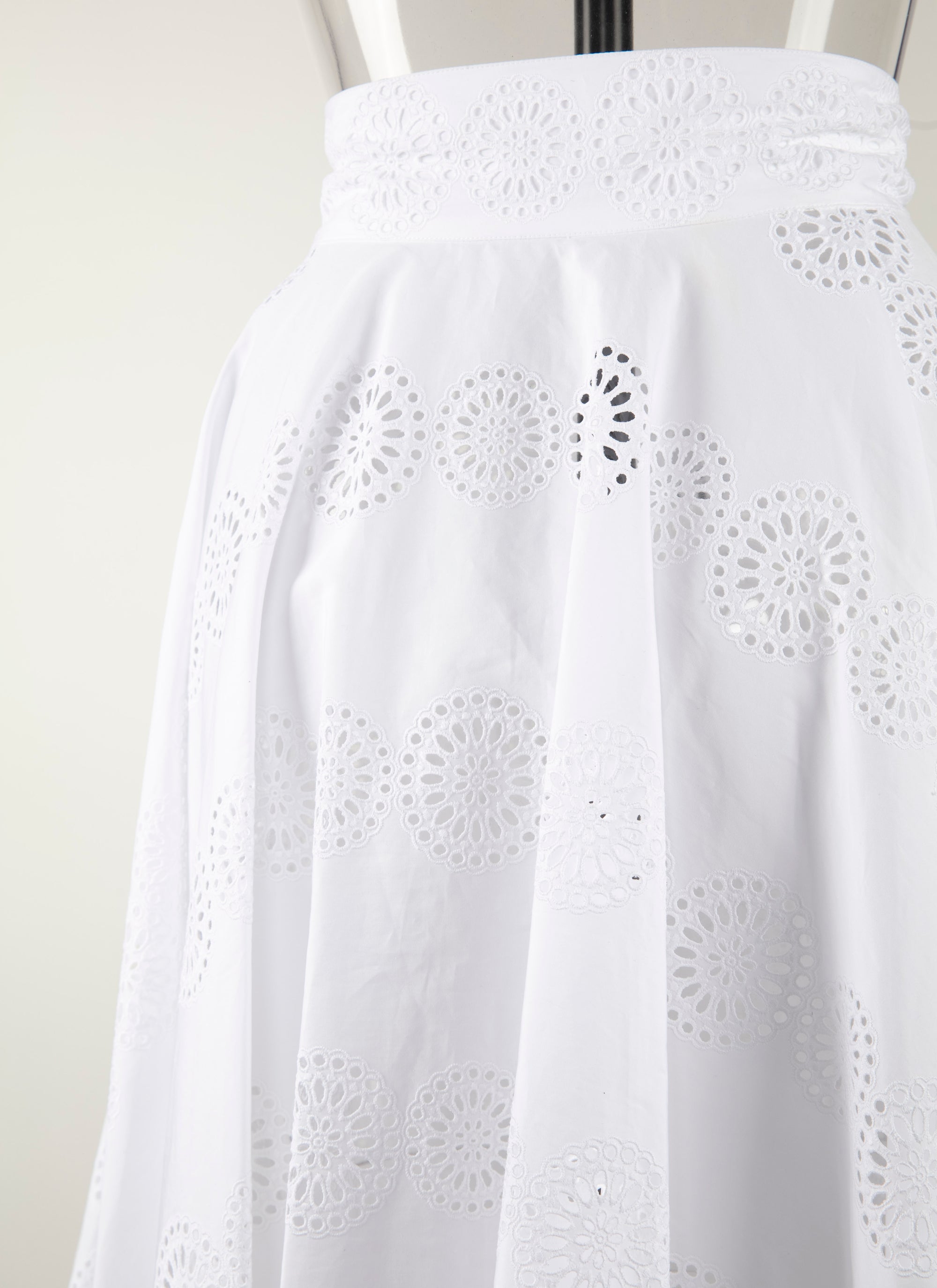 Plain mid-length skirt with perforated details - White