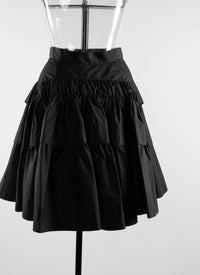 Jupe courte boutonnée avec plis - Noir