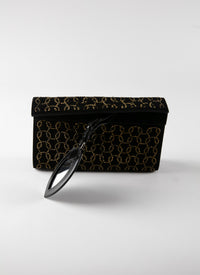 Pochette à motifs cloutés en cuir - Noir & Or