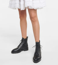 Lace-up eyelet boots in leather - Black