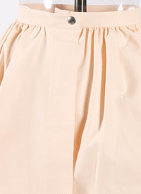 Jupe courte asymétrique ajourée - Nude
