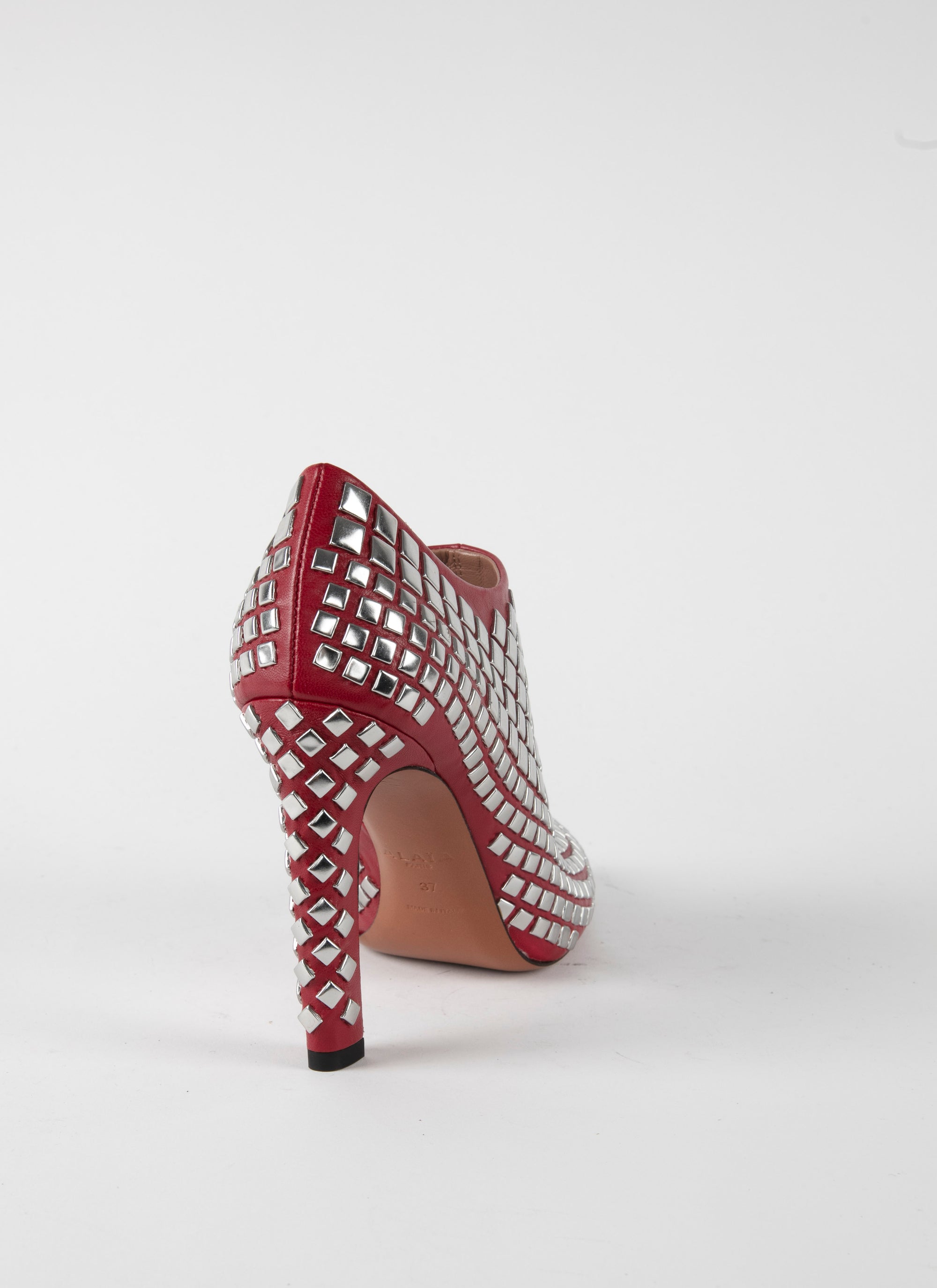 Studded platform ankle boots in leather - Lacquer